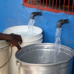 Buckets being filled with water