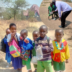 Pastor Yohana helping children